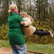 Spinning mother with daughter on park path. Playful hug shows joy, love, active childhood. Outdoor Spinning mother with daughter on park path. Playful hug shows joy, love, active childhood. Outdoor - PhotoDune Item for Sale