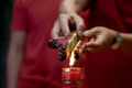 Hand holding joss sticks and candle as prayer and offering to the Gods during a chinese wedding ce Hand holding joss sticks and candle as prayer and offering to the Gods during a chinese wedding ce - PhotoDune Item for Sale