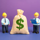 Engineers and a dollar bill. Project budget. Financial planning supports engineering decisions. Engineers and a dollar bill. Project budget. Financial planning supports engineering decisions. - PhotoDune Item for Sale