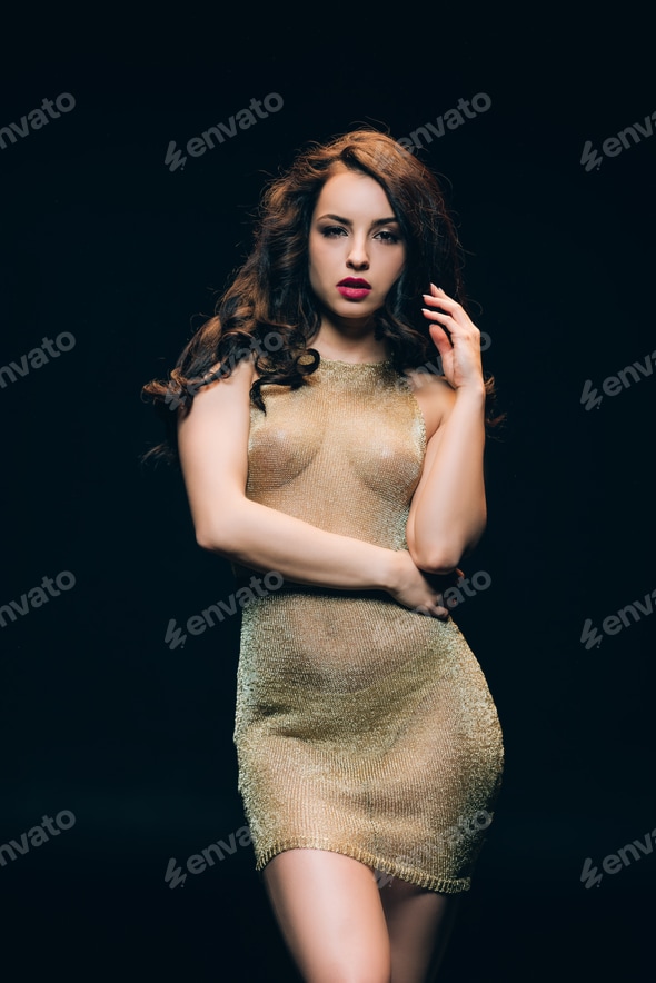 sexy elegant young woman in golden transparent dress isolated on black Stock Photo by LightFieldStudios sexy elegant young woman in golden transparent dress isolated on black Stock Photo by LightFieldStudios
