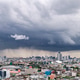 A heavy storm with rain and dramatic atmosphere clouds can be a sight to behold over a city center. A heavy storm with rain and dramatic atmosphere clouds can be a sight to behold over a city center. - PhotoDune Item for Sale