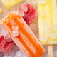 Colorful fruit ice pops on crushed ice, summer refreshment concept Colorful fruit ice pops on crushed ice, summer refreshment concept - PhotoDune Item for Sale