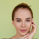 Beauty portrait of young topless red hair woman with bare shoulders on green background with perfect Beauty portrait of young topless red hair woman with bare shoulders on green background with perfect - PhotoDune Item for Sale