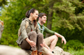 smiling couple with backpacks in nature smiling couple with backpacks in nature - PhotoDune Item for Sale
