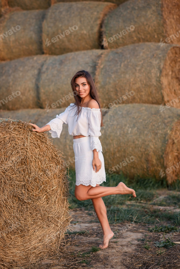 beautiful girl village girl in white dress in haystacks in village Stock Photo by Vikotikk beautiful girl village girl in white dress in haystacks in village Stock Photo by Vikotikk