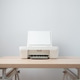 White Inkjet Printer On Wooden Desk In Minimal Home Office With Open Scanner Setup White Inkjet Printer On Wooden Desk In Minimal Home Office With Open Scanner Setup - PhotoDune Item for Sale