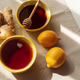 Flat Lay with Lemon Tea, Ginger and Honey on Light Table under Sun Light Flat Lay with Lemon Tea, Ginger and Honey on Light Table under Sun Light - PhotoDune Item for Sale