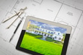 Computer Tablet Showing House Image On House Plans, Pencil, Compass Computer Tablet Showing House Image On House Plans, Pencil, Compass - PhotoDune Item for Sale