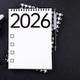 New year resolutions 2026 on desk. 2026 goals list with notebook, coffee cup, plant New year resolutions 2026 on desk. 2026 goals list with notebook, coffee cup, plant - PhotoDune Item for Sale