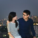 Asian Couple looking each other on rooftop with city background, Bangkok, Thailand Asian Couple looking each other on rooftop with city background, Bangkok, Thailand - PhotoDune Item for Sale