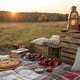 Romantic autumn picnic with lanterns, apples, and apple pie at sunset Romantic autumn picnic with lanterns, apples, and apple pie at sunset - PhotoDune Item for Sale