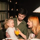 Parents with their curly daughter, having healthy meal together. Nutrition Concept. Parents with their curly daughter, having healthy meal together. Nutrition Concept. - PhotoDune Item for Sale
