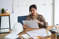 Female architect woman working on project at modern office. Female architect woman working on project at modern office. - PhotoDune Item for Sale
