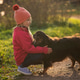 Little Girl Hugging Dog In Soft Light Little Girl Hugging Dog In Soft Light - PhotoDune Item for Sale