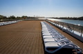 Cruise ship sun deck with line of lounge chairs Cruise ship sun deck with line of lounge chairs - PhotoDune Item for Sale