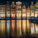 Amsterdam Netherlands night. Colorful houses canal water street architecture Amsterdam Netherlands night. Colorful houses canal water street architecture - PhotoDune Item for Sale