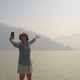 Asia serene people blogger vlogger look at rural water river share content creator Asia serene people blogger vlogger look at rural water river share content creator - PhotoDune Item for Sale