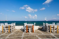 A restaurant overlooking Little Venice, Mykonos Island, Greece. Lunch and dinner overlooking the sea A restaurant overlooking Little Venice, Mykonos Island, Greece. Lunch and dinner overlooking the sea - PhotoDune Item for Sale