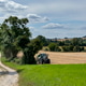 Farm track and agricultural vehicle - North Yorkshire in the northeast of England Farm track and agricultural vehicle - North Yorkshire in the northeast of England - PhotoDune Item for Sale