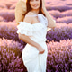 Portrait of a girl in lavender field holding violet lavender flowers Portrait of a girl in lavender field holding violet lavender flowers - PhotoDune Item for Sale