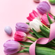 Easter spring tulips bouquet with eggs and ribbon on a pastel background Easter spring tulips bouquet with eggs and ribbon on a pastel background - PhotoDune Item for Sale