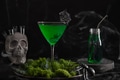 Halloween green cocktails with skulls, spiders and smoke on black Halloween green cocktails with skulls, spiders and smoke on black - PhotoDune Item for Sale