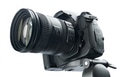 DSLR camera on tripod, isolated white background DSLR camera on tripod, isolated white background - PhotoDune Item for Sale