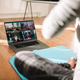 Woman conducting virtual fitness classes over video conference Woman conducting virtual fitness classes over video conference - PhotoDune Item for Sale