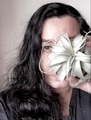 Female holding air plant, Xerographica Female holding air plant, Xerographica - PhotoDune Item for Sale
