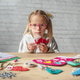 Little girl making diy christmas decoration Little girl making diy christmas decoration - PhotoDune Item for Sale