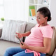 happy pregnant woman with tablet pc at home happy pregnant woman with tablet pc at home - PhotoDune Item for Sale