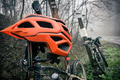 Mountain bike and helmet in autumn woods Mountain bike and helmet in autumn woods - PhotoDune Item for Sale