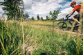 Mountain biking man riding in woods and mountains Mountain biking man riding in woods and mountains - PhotoDune Item for Sale