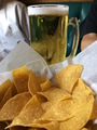 Happy hour time with beer & tortilla chips at the Mexican restaurant. Happy hour time with beer & tortilla chips at the Mexican restaurant. - PhotoDune Item for Sale