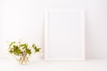 White frame mockup with Rue Anemone flowers White frame mockup with Rue Anemone flowers - PhotoDune Item for Sale