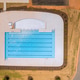 Swimmers enjoy large community pool on sunny afternoon in tranquil neighborhood Swimmers enjoy large community pool on sunny afternoon in tranquil neighborhood - PhotoDune Item for Sale