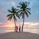Couple enjoying a romantic sunset walk on a serene beach in Saint Lucia, Caribbean paradise Couple enjoying a romantic sunset walk on a serene beach in Saint Lucia, Caribbean paradise - PhotoDune Item for Sale