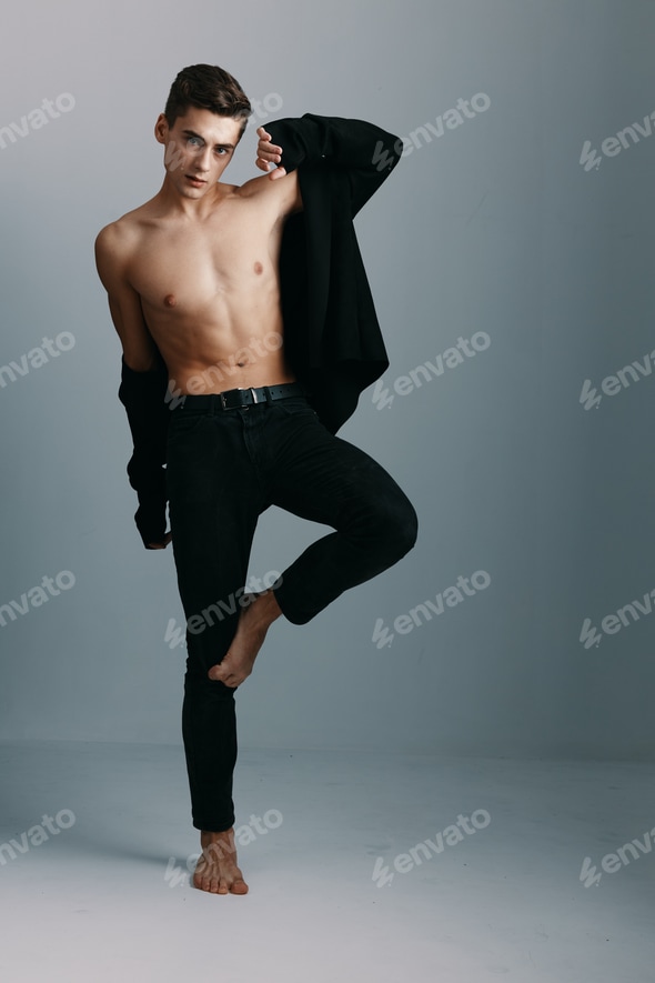 Sexy man with a naked torso black trousers and a jacket gray background suit Stock Photo by shotprime Sexy man with a naked torso black trousers and a jacket gray background suit Stock Photo by shotprime