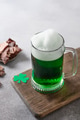 Patrick's day green beer in pint and jerky on gray background. Patrick's day green beer in pint and jerky on gray background. - PhotoDune Item for Sale