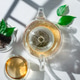 Glass teapot and cups on tablecloth, green Glass teapot and cups on tablecloth, green - PhotoDune Item for Sale