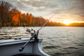 Fishing rod on the boat. Autumn season Fishing rod on the boat. Autumn season - PhotoDune Item for Sale