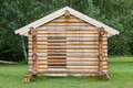 Wooden cabin in the forest under construction. Raw materials. Finland Wooden cabin in the forest under construction. Raw materials. Finland - PhotoDune Item for Sale
