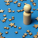 Achievement and personal growth concept with wooden peg doll standing among many scattered stars Achievement and personal growth concept with wooden peg doll standing among many scattered stars - PhotoDune Item for Sale