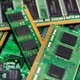 A stack of old SDRAM memory modules lying on a printed circuit board. A stack of old SDRAM memory modules lying on a printed circuit board. - PhotoDune Item for Sale