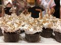 Graduation celebration. Cupcakes side view with mortarboard decorations. Graduation celebration. Cupcakes side view with mortarboard decorations. - PhotoDune Item for Sale