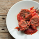 Burgos Blood Sausage Served With Tomato Sauce on a Plate Burgos Blood Sausage Served With Tomato Sauce on a Plate - PhotoDune Item for Sale