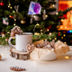 Gingerbread house cookie on mug with Christmas tree lights Gingerbread house cookie on mug with Christmas tree lights - PhotoDune Item for Sale