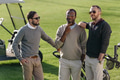 pensive multiethnic golf players standing on golf course pensive multiethnic golf players standing on golf course - PhotoDune Item for Sale