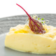 Creamy dish with herbs served on a dark plate Creamy dish with herbs served on a dark plate - PhotoDune Item for Sale