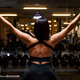 Young woman in the gym showing muscles Young woman in the gym showing muscles - PhotoDune Item for Sale